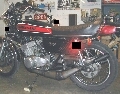 Triple Ed's bike with tomcat's pipes